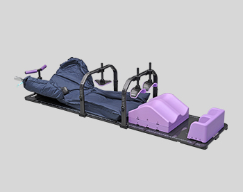 SBRT immobilisation system with platform, belly bridge, knee bridge, wing-board T-grip and T-shaped vacuum cushion arranged on a linac couch